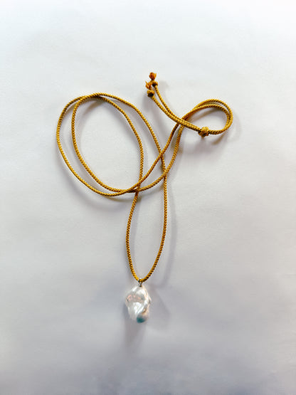 BAROQUE PEARL ON OCHRE KUMIHIMO SILK
