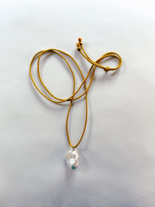 BAROQUE PEARL ON OCHRE KUMIHIMO SILK