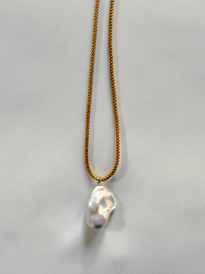 BAROQUE PEARL ON OCHRE KUMIHIMO SILK