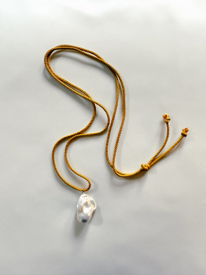 BAROQUE PEARL ON OCHRE KUMIHIMO SILK