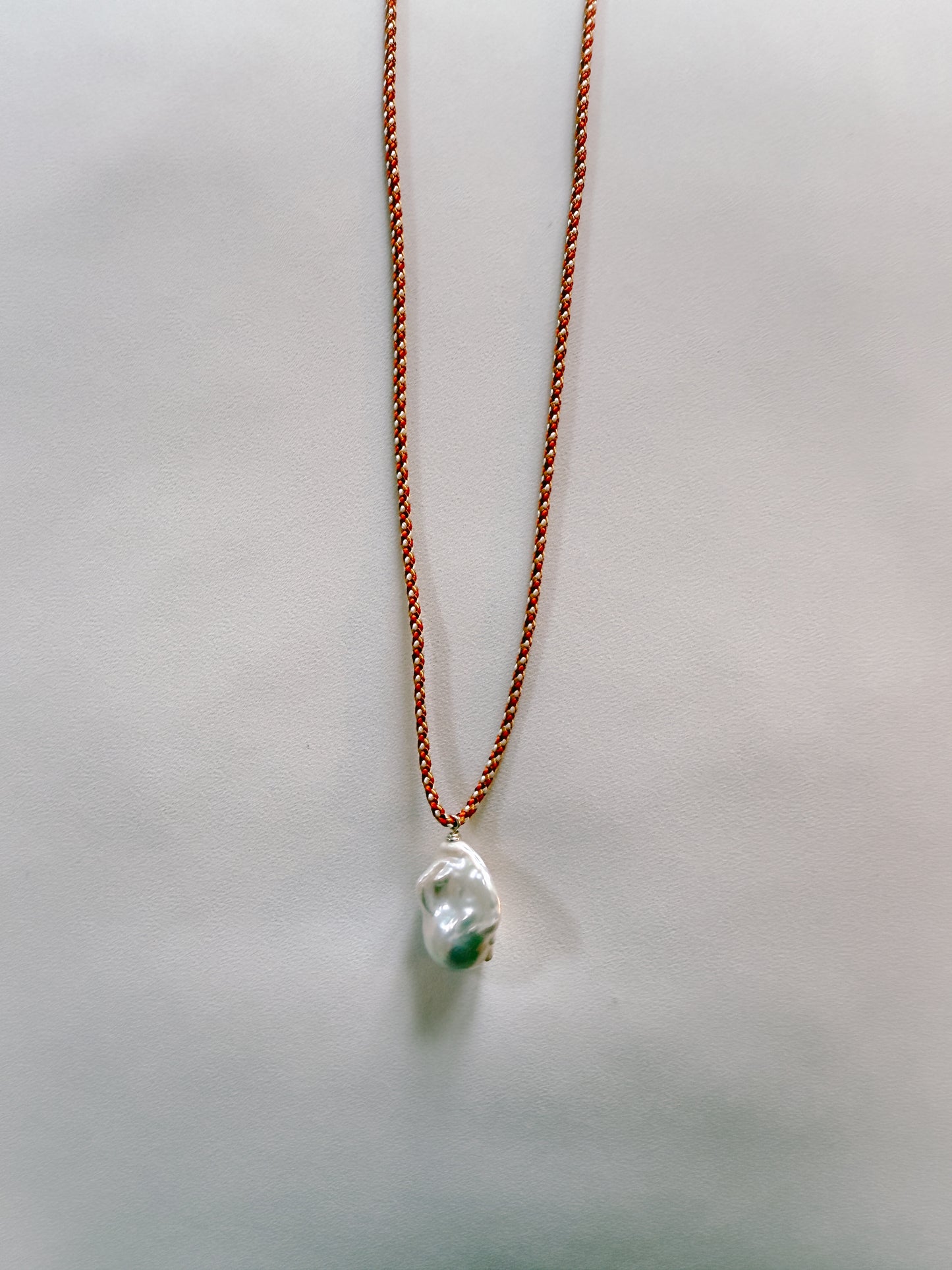 BAROQUE PEARL ON EMBER KUMIHIMO SILK